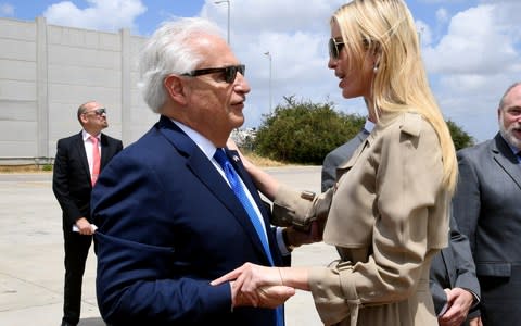  Ivanka Trump greets US Ambassador to Israel David Friedman upon her arrival at the Ben Gurion International Airport - Credit:  HANDOUT/ REUTERS