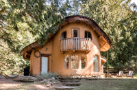 <a href="https://www.airbnb.com/rooms/plus/1720832" rel="nofollow noopener" target="_blank" data-ylk="slk:Cob Cottage;elm:context_link;itc:0;sec:content-canvas" class="link "><strong>Cob Cottage</strong></a><strong>, Mayne Island, Canada Wish Listed 152,918 times</strong> This one-of-a-kind earth house in Canada was hand sculpted using sustainable materials and has all the amenities of a modern retreat. Inside, guests love every inch of this home featuring custom woodwork and the sheep and chickens outside, offering fresh eggs and milk for morning meals.