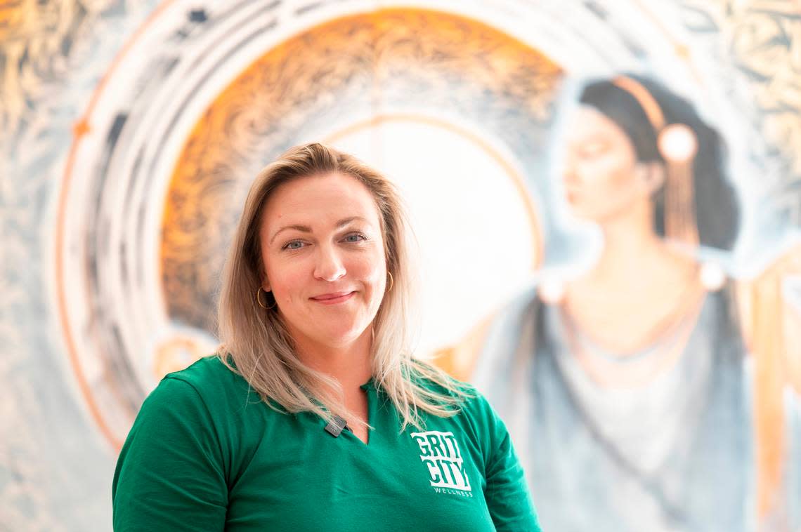 Chyna Willman, owner and founder of Grit City Wellness, poses for a portrait in the yoga studio at her facility in Point Ruston on Friday, July 22, 2022, in Tacoma, Wash.