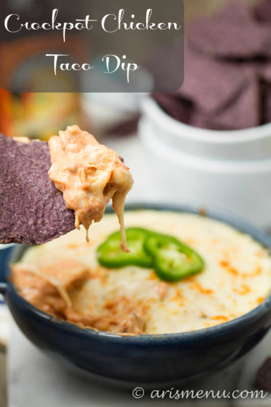 <p>Ari's Menu</p><p>This flavorful, rich and bold chicken taco dip made in a slow cooker. It's topped with lots of pepper jack cheese. <a href="http://arismenu.com/crockpot-chicken-taco-dip/" rel="nofollow noopener" target="_blank" data-ylk="slk:Get the recipe HERE;elm:context_link;itc:0;sec:content-canvas" class="link rapid-noclick-resp">Get the recipe HERE</a>.</p>