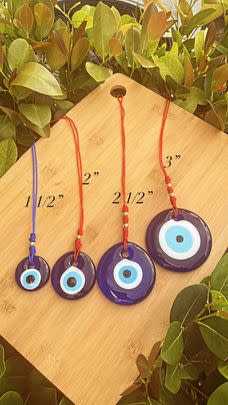 A classic evil eye wall hanging made of glass