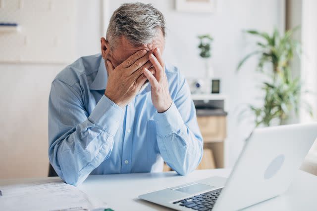 <p>Getty</p> Stock image of male at computer