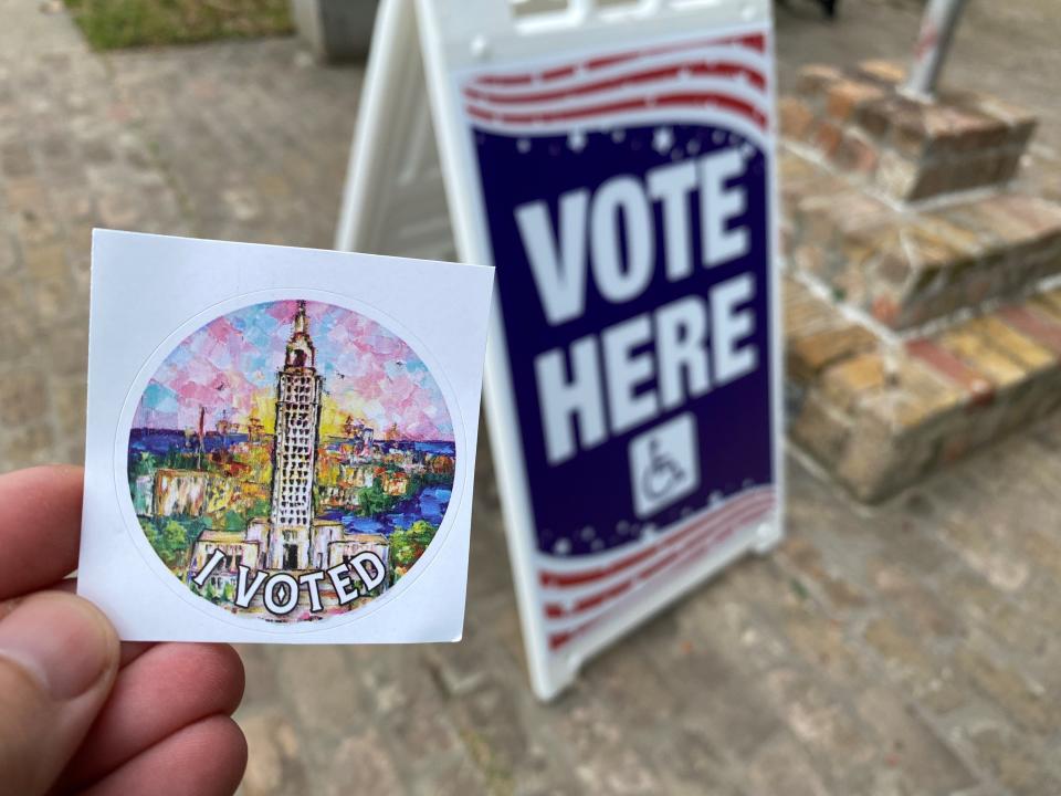 A Louisiana "I Voted" sticker shows the art of New Orleans artist Becky Fos outside the Ascension Parish Courthouse in Donaldsonville on the first day of early voting, Oct. 25.