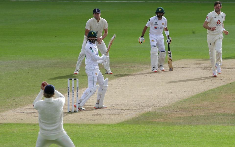 Joe Root claims the all-important catch - AP