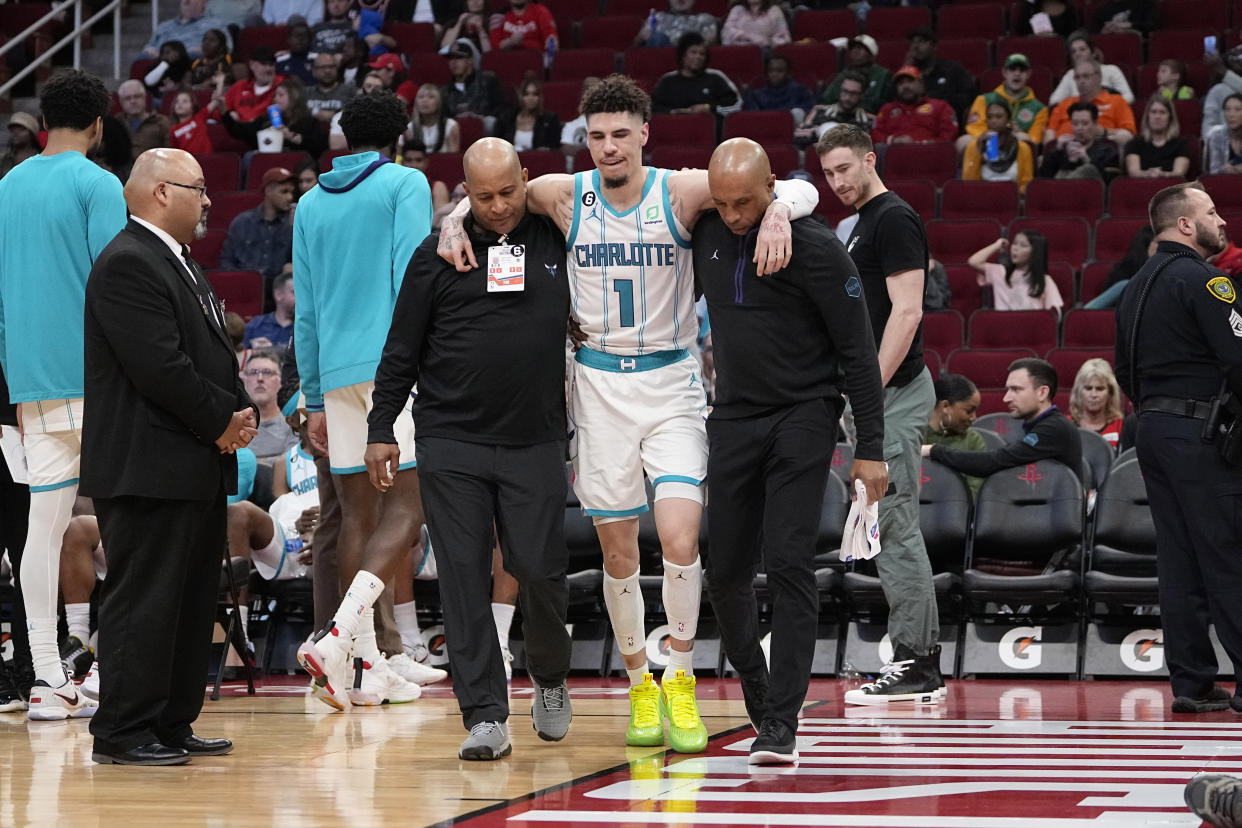 LaMelo Ball left the Hornets' matchup with the Rockets in the third quarter Wednesday. (AP/David J. Phillip)