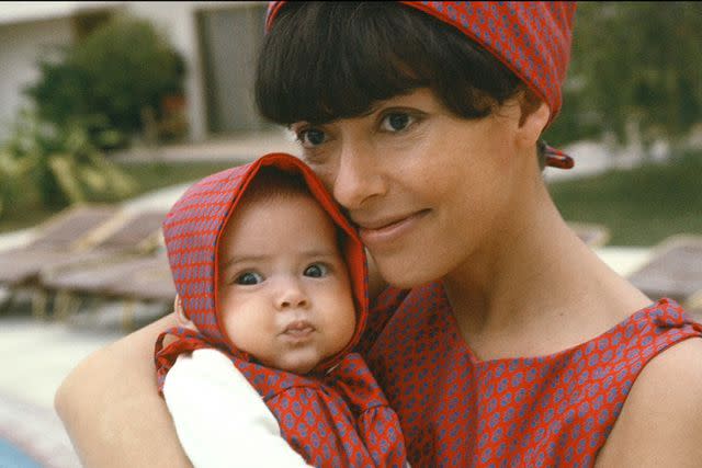 <p>Courtesy Rita Moreno & Fernanda Gordon</p> Rita Moreno holding her daughter, Fernanda, in 1966