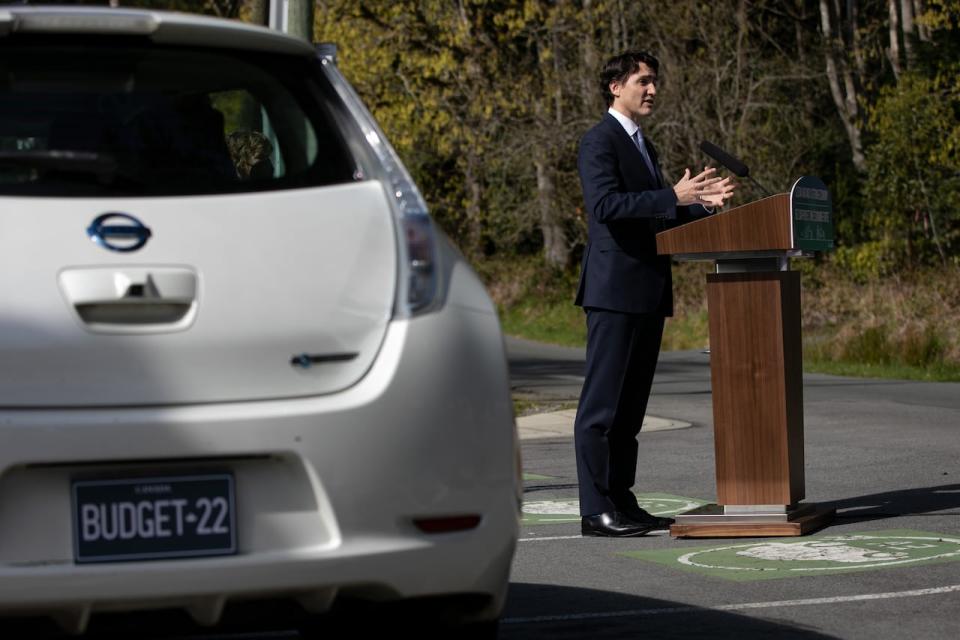 Prime Minister Justin Trudeau makes an announcement highlighting Budget 2022 investments in electric vehicle infrastructure in Victoria in April. Electric vehicles will be part of the solution, writes Paris Marx, but meeting the challenge of climate change will require taking on the dominance of cars.