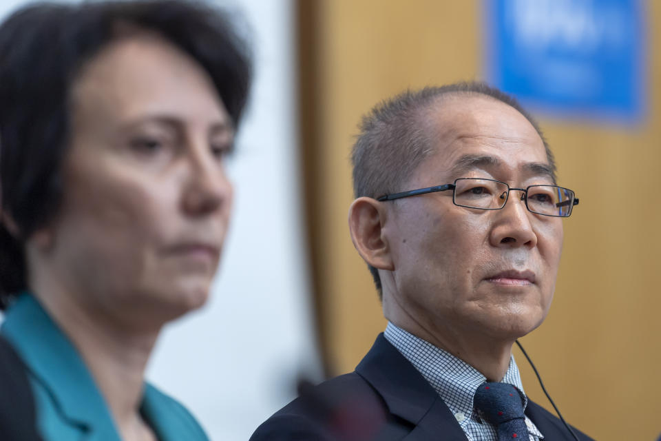 Elena Manaenkova, left, WMO Deputy Secretary-General and Hoesung Lee, right, chair of the United Nations Intergovernmental Panel on Climate Change (IPCC) attend a news conference on the Special Report on Climate Change and Land after IPCC's 50th session in Geneva, Switzerland, Thursday, Aug. 8, 2019. (Martial Trezzini/Keystone via AP)