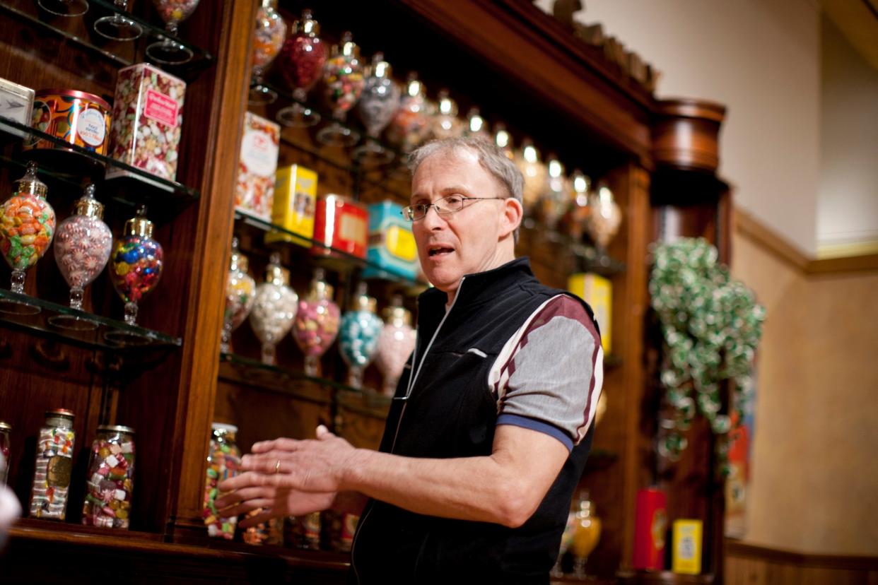 David Bainbridge, the senior curator, shows a new exhibit titled "Sweet! The Wonderful World of Chocolate, Candy and Ice Cream" on Monday, March 18, 2013, at the Center for History in South Bend.