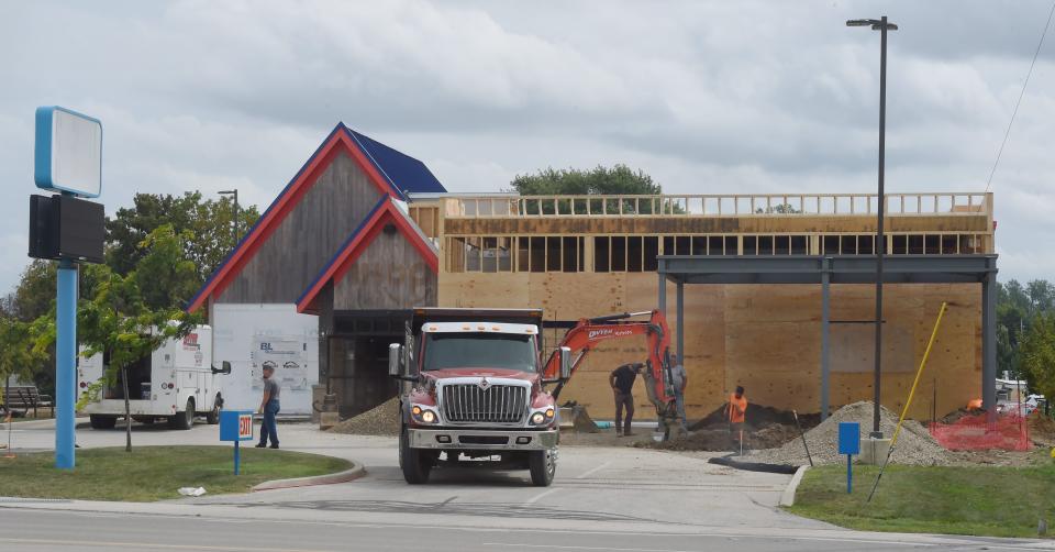 Construction continues on the former IHOP building near West 12th St. and Peninsula Drive in Millcreek Township.