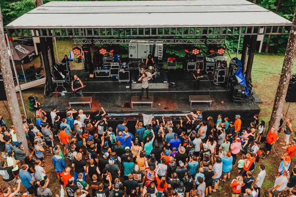 The Alive Music Festival at Atwood Lake Park features three stages, including a main one and this stage in the woods. The annual event is Thursday through Sunday and features Christian music, worship and camping.