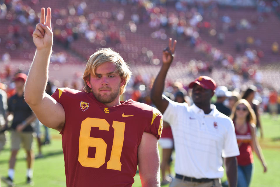 Blind USC long snapper Jake Olson excelled at golf in high school. (Getty Images)