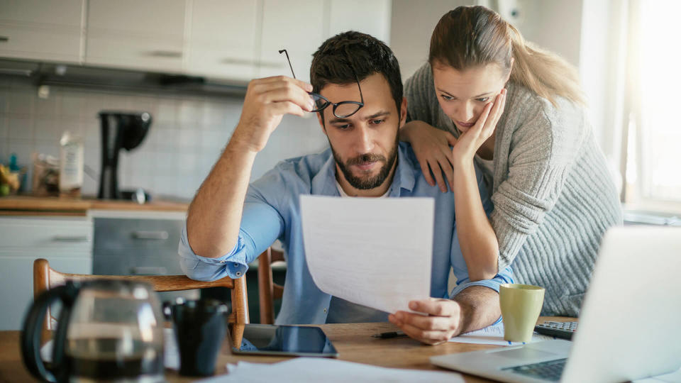 Photo of a young couple going through financial problems.