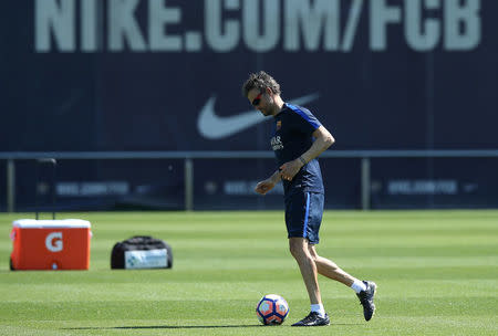 Soccer Football - Barcelona training session - La Liga - Joan Gamper training camp, Barcelona, Spain - 22/4/2017 - Barcelona's coach Luis Enrique plays with a ball. REUTERS/Albert Gea