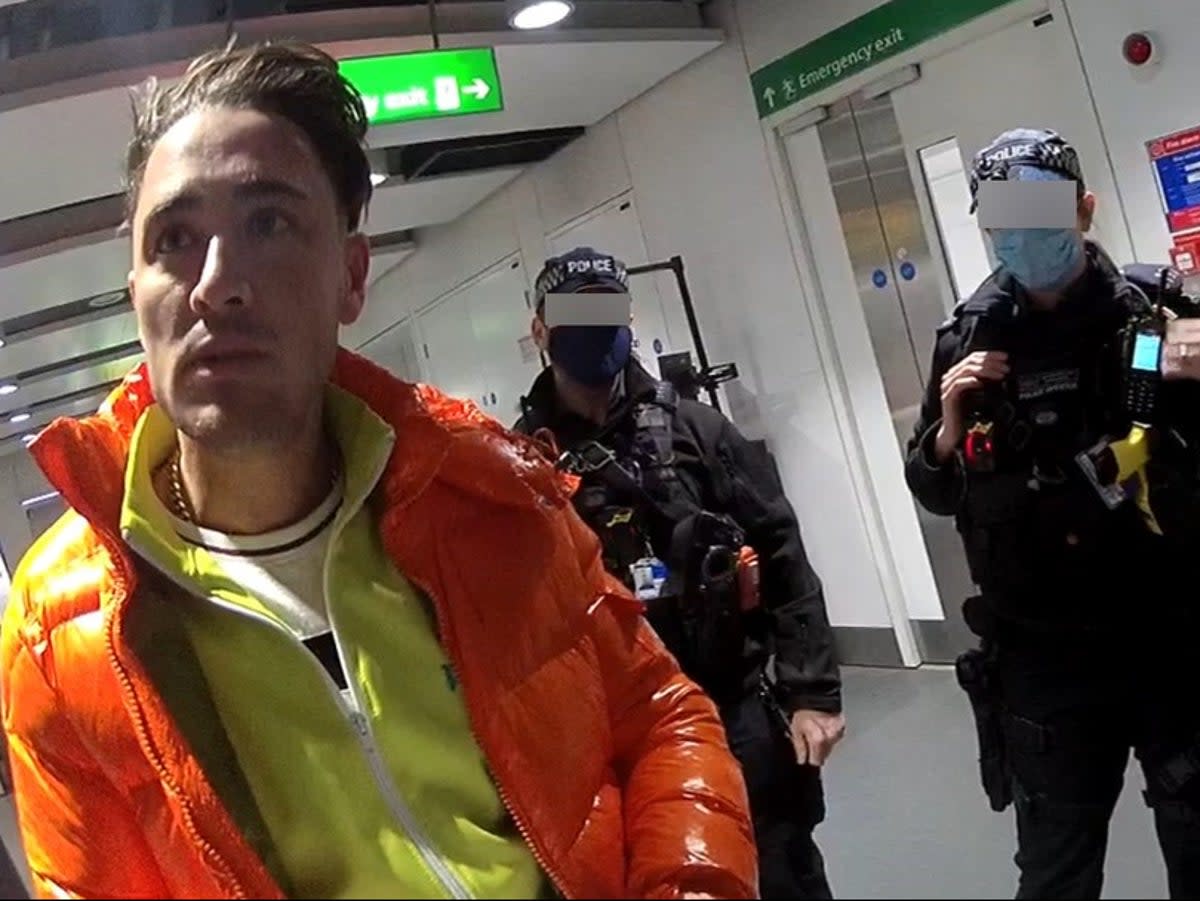 Stephen Bear being arrested at Heathrow Airport (Essex Police)