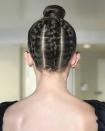 <p>Millie Bobby Brown channelled Dior at this year's Golden Globes with a seriously slick bun that revealed a secret trio of braids at the back. Created by celeb hairstylist Blake Erik, the plaited updo added a sneaky bit of unexpected to the actress' pared back black ensemble.</p>