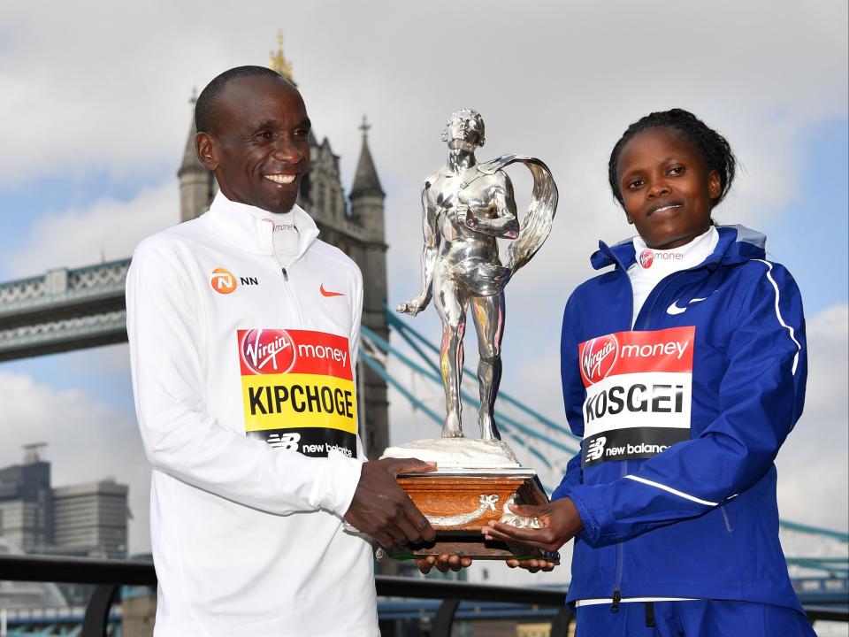 Last year's men's and women's winners: Eliud Kipchoge and Brigid KosgeiAFP via Getty Images