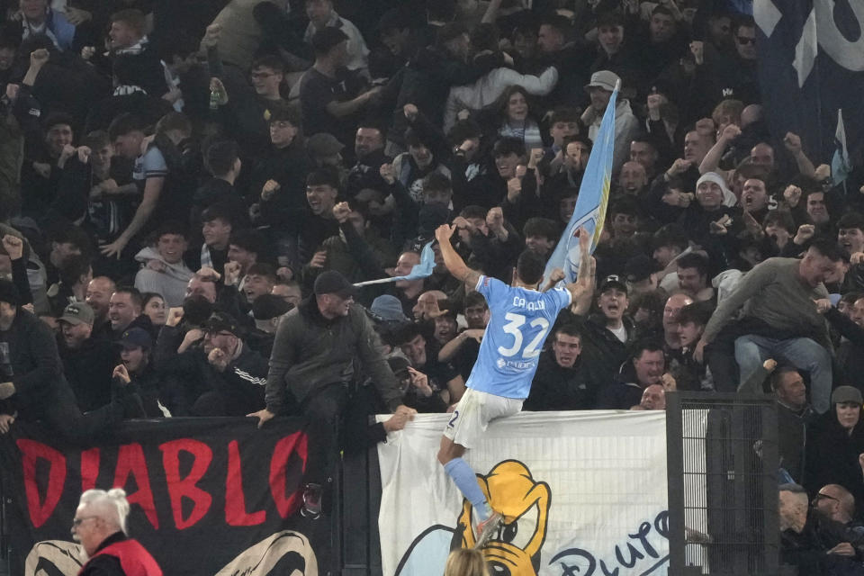 Lazio's Danilo Cataldi celebrates his side's first goal during the Italian Serie A soccer match between Lazio and Roma at Rome's Olympic stadium, Sunday, March 19, 2023. (AP Photo/Gregorio Borgia)