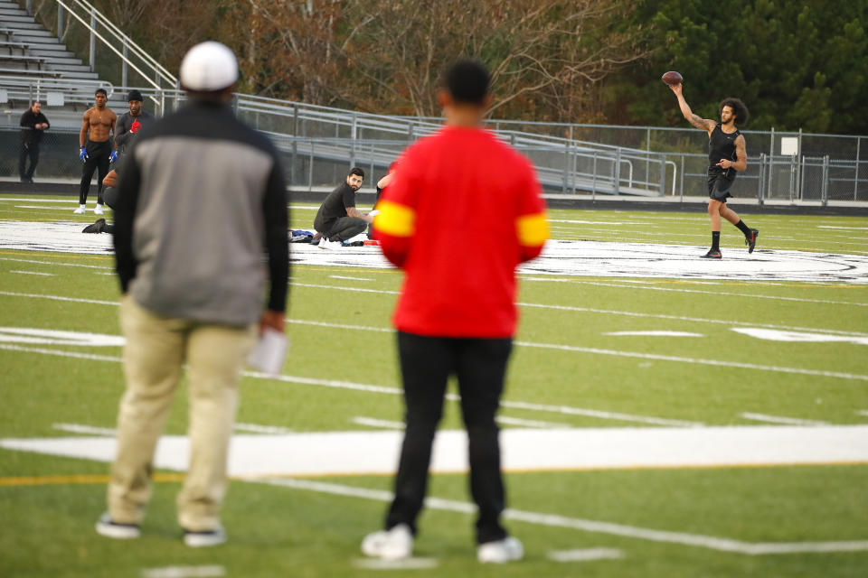 Free agent quarterback Colin Kaepernick participates in a workout for NFL football scouts and media, Saturday, Nov. 16, 2019, in Riverdale, Ga. (AP Photo/Todd Kirkland)