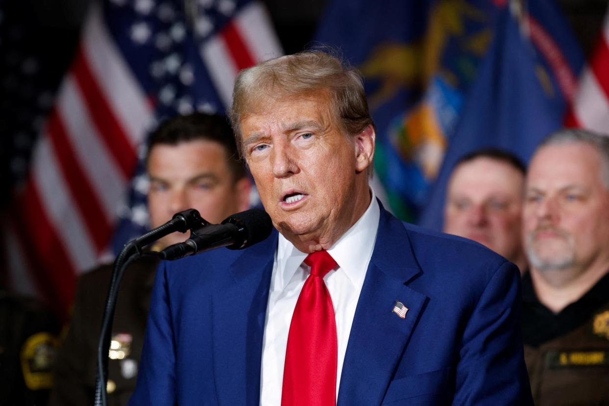 <span>Donald Trump campaigns in Grand Rapids, Michigan, on 2 April 2024.</span><span>Photograph: Rebecca Cook/Reuters</span>