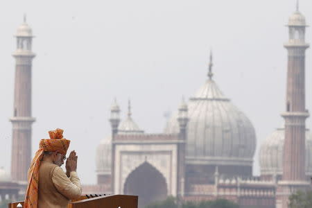 Indian Prime Minister Narendra Modi folds his hands in a traditional Indian greeting after addressing the nation from the historic Red Fort during Independence Day celebrations in Delhi, India, August 15, 2015. REUTERS/Adnan Abidi