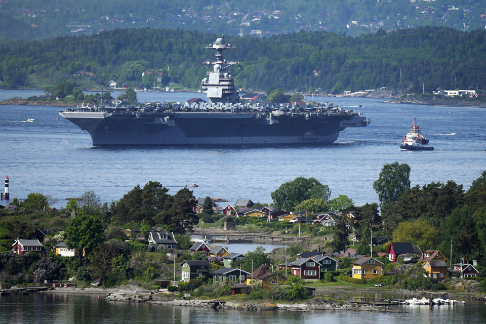 The American aircraft carrier USS Gerald R. Ford drives in the Oslo Fjord, Norway, here seen from Ekebergskrenten, Wednesday, May 24, 2023. The ship is the world's largest warship and will be in port in Oslo for four days. (Javad Parsa/NTB Scanpix via AP)