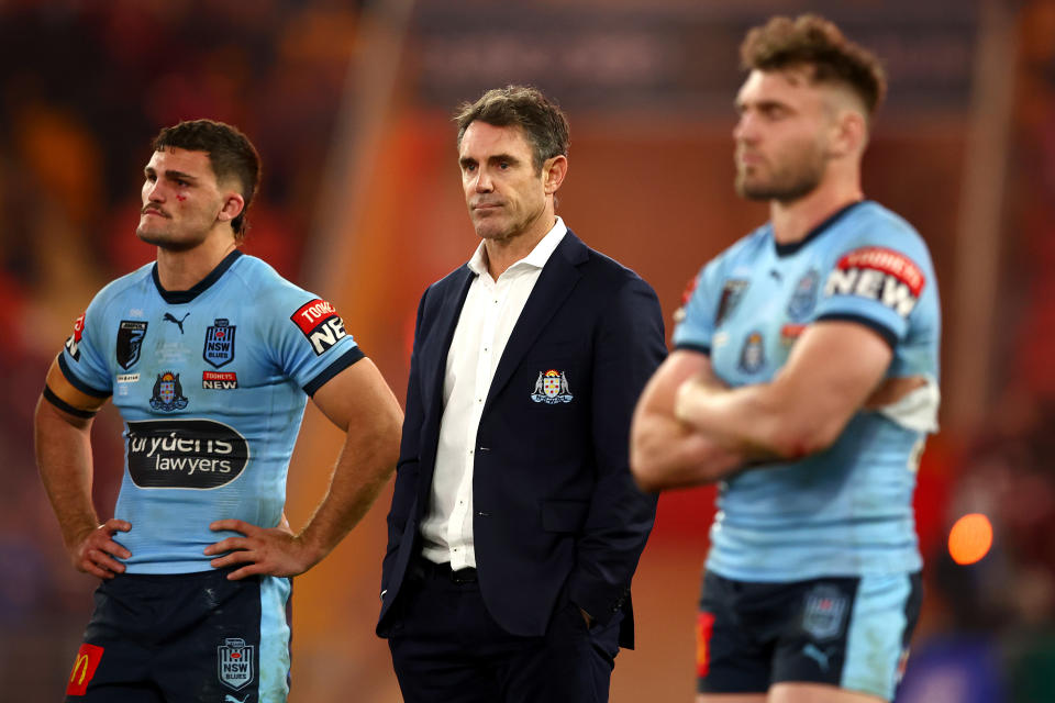 Blues coach Brad Fittler (pictured middle) looking on during the State of Origin presentation.