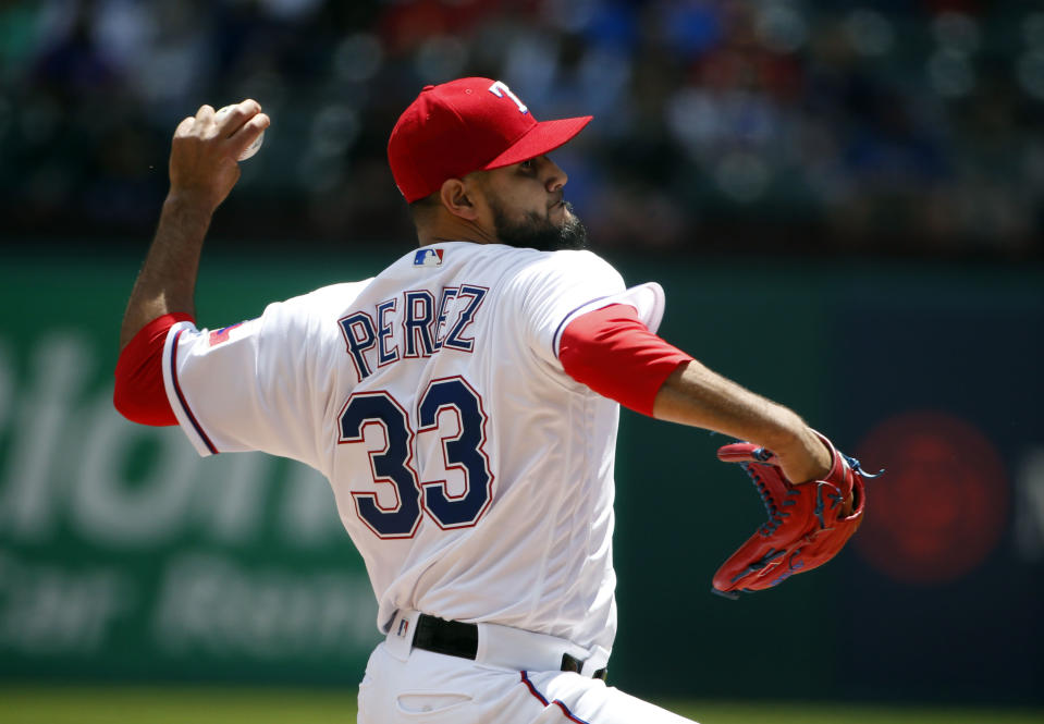 Rangers pitcher Martin Pérez can’t seem to escape the bull that injured him this winter. (AP Photo/Michael Ainsworth)