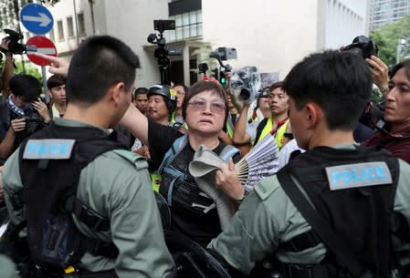 People attend a protest in Hong Kong