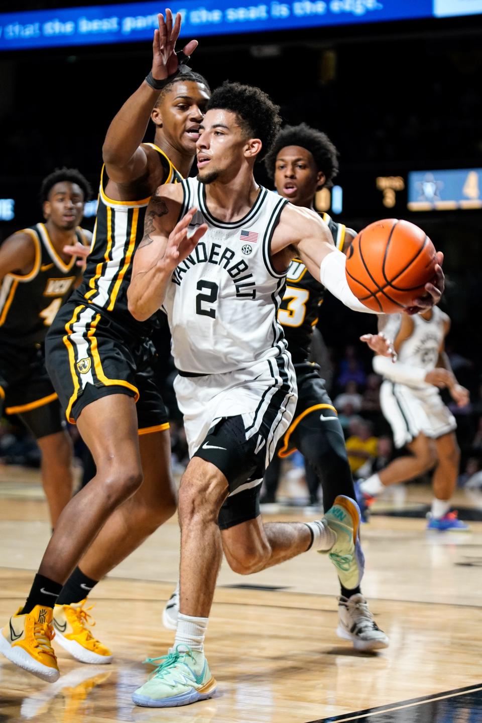 Vanderbilt guard Scotty Pippen Jr. (2) looks to pass past VCU guard Jayden Nunn (23) during the first half at Memorial Gym in Nashville, Tenn., Wednesday, Nov. 17, 2021.