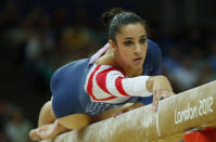 Alexandra Raisman of the U.S. competes in the women's gymnastics balance beam final in the North Greenwich Arena during the London 2012 Olympic Games August 7, 2012. REUTERS/Brian Snyder (BRITAIN - Tags: SPORT GYMNASTICS OLYMPICS) 