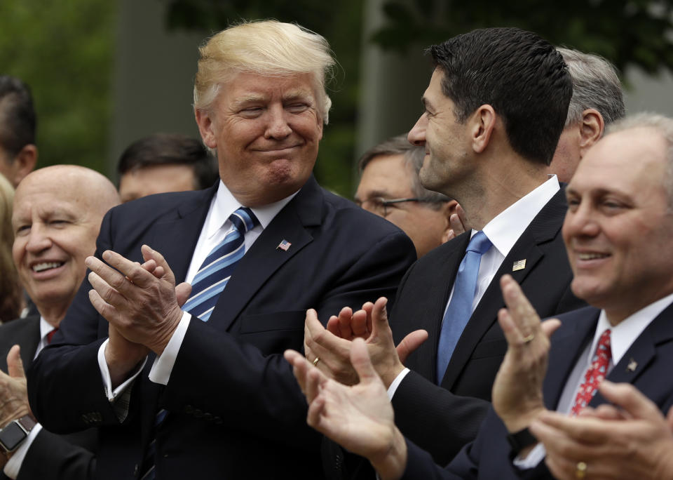 President Donald Trump talks with House Speaker Paul Ryan of Wis., in the Rose Garden of the White House in Washington, May 4, 2017, after the House pushed through a health care bill. House Majority Whip Steve Scalise of La. is at left, and House Ways and Means Committee Chairman Rep. Kevin Brady, R-Texas is at right. (Photo:Evan Vucci/AP)