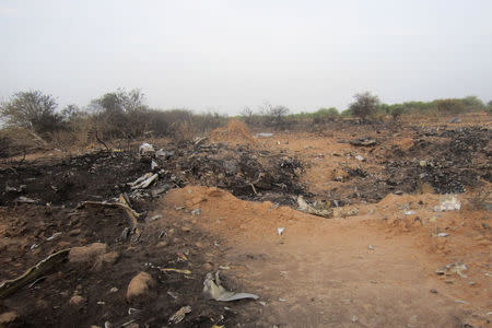 The crash site of Air Algerie flight AH5017 is seen near the northern Mali town of Gossi, July 24, 2014. REUTERS/Burkina Faso Military/Handout via Reuters