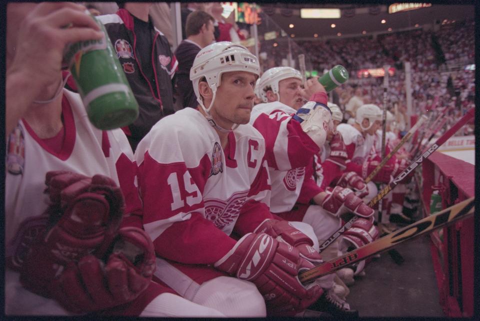 Steve Yzerman sits on the bench as the Detroit Red Wings and Philadelphia Flyers play Game 3 of the Stanley Cup Finals at Joe Louis Arena, June 5, 1997.