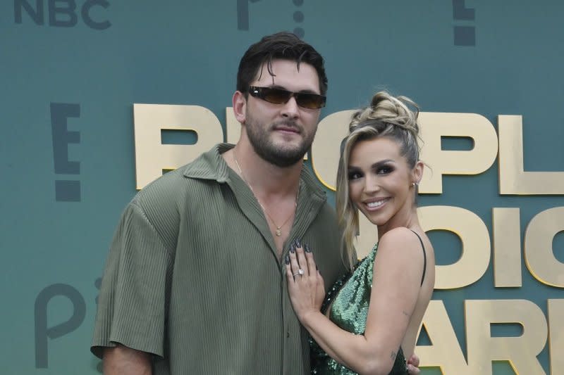 Scheana Shay (R) and Brock Davies attend the People's Choice Awards on Sunday. Photo by Jim Ruymen/UPI