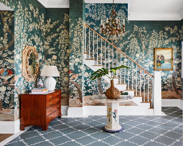 PHOTOGRAPHY BY LAUREY W. GLENN; STYLING BY KENDRA SURFACE Designer Charlotte Lucas commissioned artist Madison Mauck to hand paint a stenciled design on the entry floor of our 2022 Southern Living Idea House.