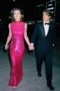 <p> If you’re a fan of a great sequin dress, you’ll be as enamoured as us with this hot pink sequin maxi dress which Elizabeth wore to the César Awards in 2005. The high neck, and maxi-length style effortlessly contrast the slightly sheer fabric, giving an elegant feel to what is a show-stopping dress. </p>