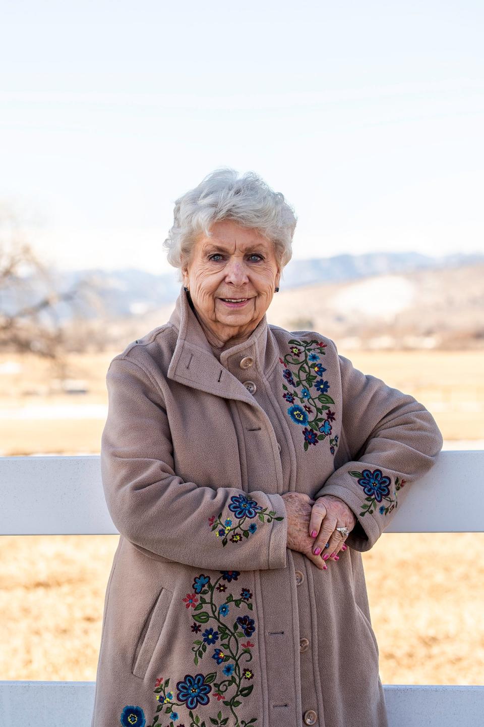 Carol Yoakum, 91, poses for a picture at her former Longmont farm Tuesday.