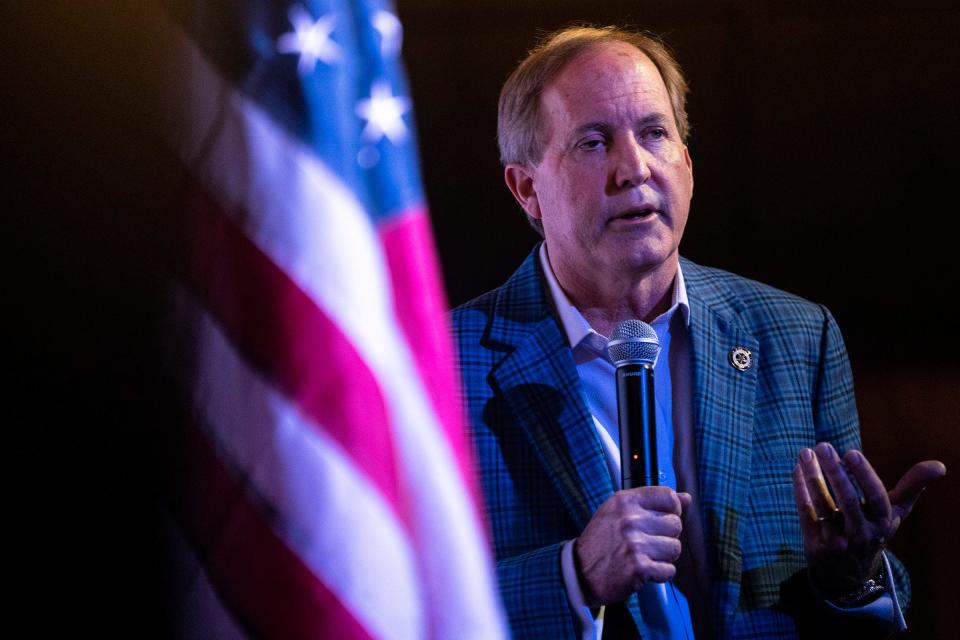 Attorney General Ken Paxton speaks to supporters as he supports Tom Glass in his campaign for Texas State Representative District 17 at Film Alley in Bastrop on Wednesday, Jan. 24, 2024.