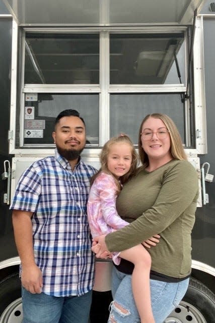 Ravuth “Johnny” Tahn, Jessica Eck and their daughter Dakota moved from Seattle, Washington, to start a food truck in Sioux Falls. They plan to open Cheezy Noodlez sometime next week.