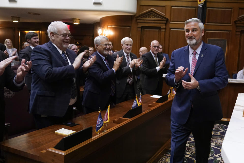 Indiana Gov. Eric Holcomb delivers his State of the State address to a joint session of the legislature at the Statehouse, Tuesday, Jan. 10, 2023, in Indianapolis. (AP Photo/Darron Cummings)