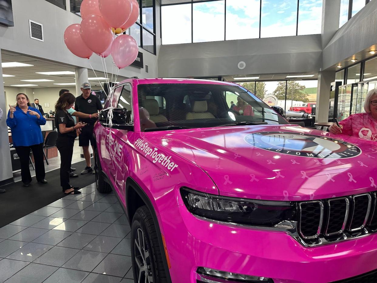 Step One Automotive Group will drive this pink Jeep around the community in October collecting signatures. For each signature that appears on the Jeep, the company will donate $1,000 to various cancer-fighting charities.