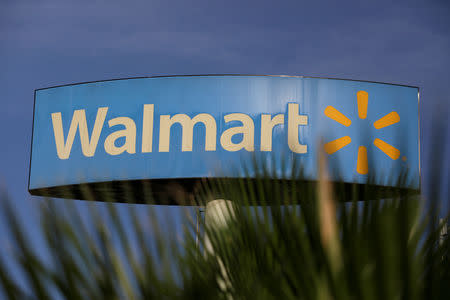 FILE PHOTO: A Walmart sign is pictured at one of their stores in Monterrey, Mexico, April 26, 2017. REUTERS/Daniel Becerril - RC119BFEE530/File Photo