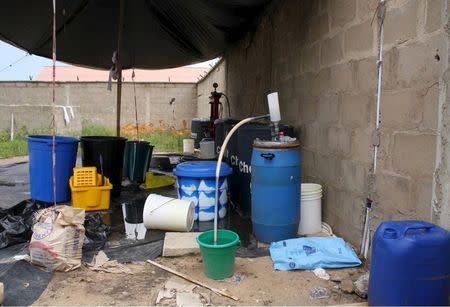 A clandestine methamphetamine laboratory is seen inside a compound at Monkey Village in Lagos, Nigeria, in this undated photograph taken from a National Drug Law Enforcement Agency (NDLEA) powerpoint presentation provided to Reuters, July 9, 2015. REUTERS/NDLEA/Handout via Reuters