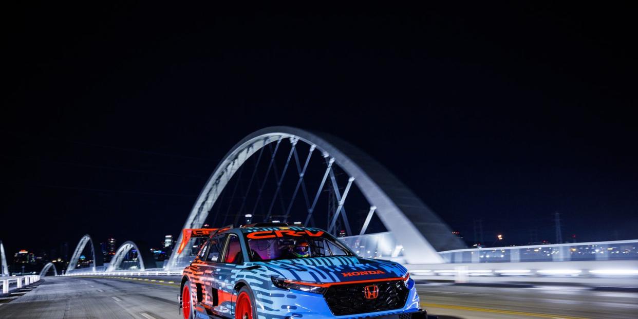 hpd honda cr v hybrid racer exterior shot bridge