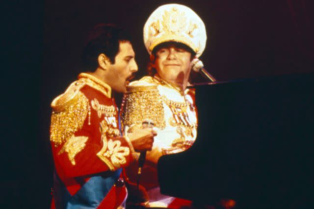 <p>Philip Ollerenshaw/Shutterstock</p> Freddie Mercury and Elton John perform together in 1984