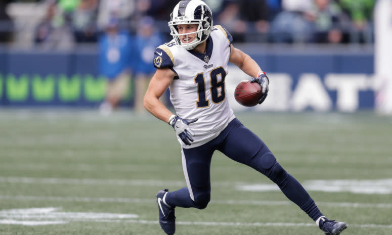 Cooper Kupp running with the football.