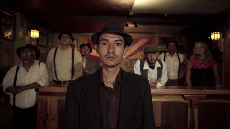 This undated photo provided by 4th Row Films shows Fernando Serrano, 23, who plays a striking miner in "Bisbee '17," a story of how some 1,200 miners, most of them immigrants, were pulled violently from their homes in Bisbee, Ariz., by a private police force and put on cattle cars for deportation to a desolate area of New Mexico in 1917. The dark history of Bisbee was largely an open secret for decades in the funky old copper town just seven miles north of the U.S.-Mexico border. It's the sixth film of director Robert Greene, who said he learned about the town southeastern Arizona around 15 years ago. (Jarred Alterman/4th Row Films via AP)