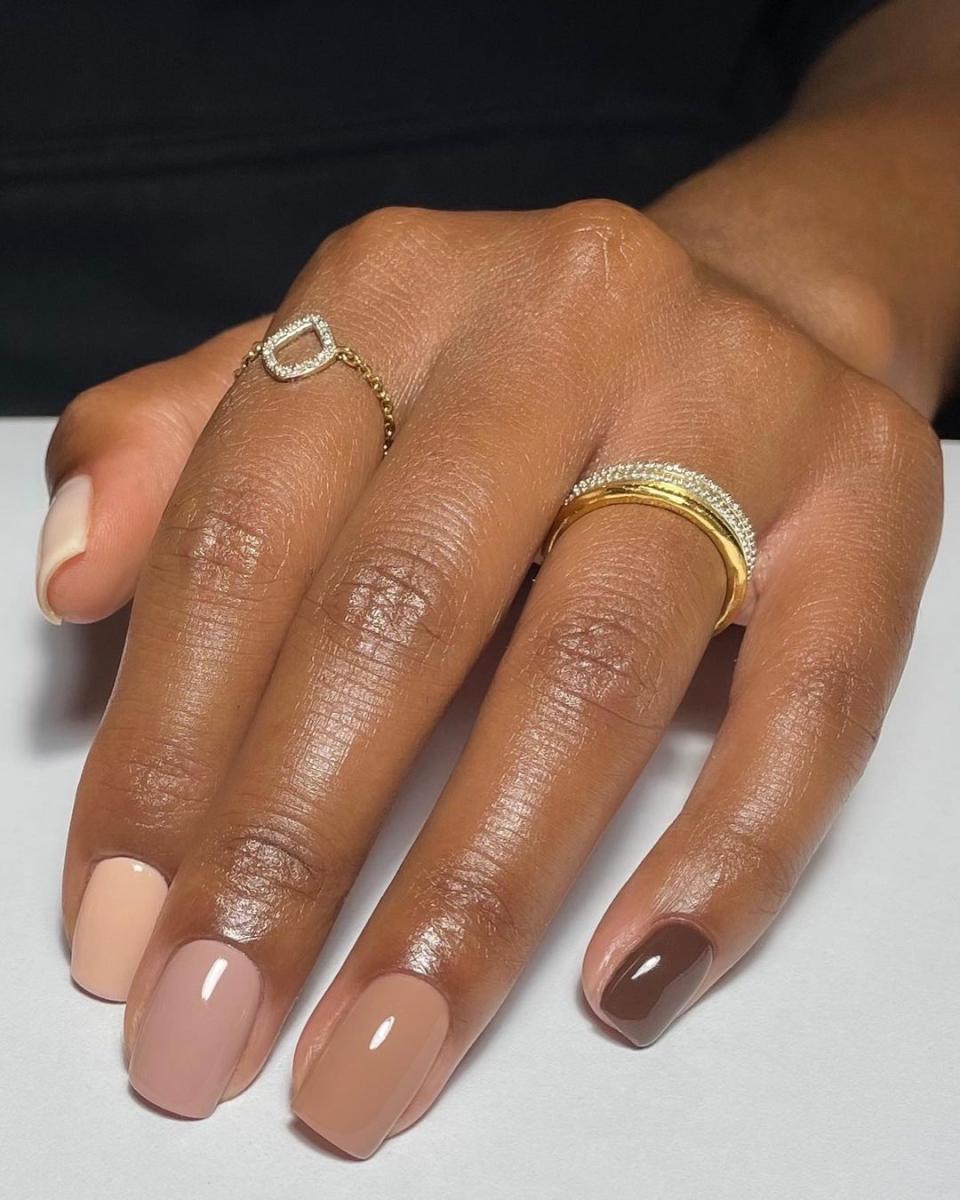 Ombré nails—or the “Skittles manicure”—remains one of the easiest nail art ideas out there. This variation in different shades of brown (we like <a href="https://cna.st/affiliate-link/2hc5hQAHwcH8MgSAyfKsDr28j8DZ87S7UY14YZ2AuHYfyX12tw5VZyvtHPSePDHjSWB3vUASvEo1rpjwL3W1U7GnLBMdYrpWX4VcCwepNkS?cid=5c659e233522902e4a03fbd8" rel="nofollow noopener" target="_blank" data-ylk="slk:Olive & June's selection;elm:context_link;itc:0;sec:content-canvas" class="link ">Olive & June's selection</a>) is perfect for curling around a cup of hot cider.