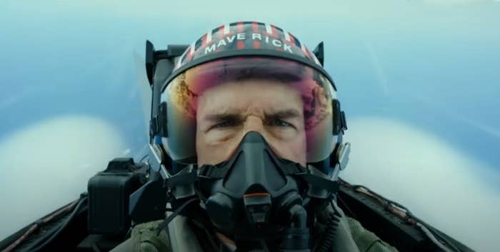 Tom Cruise as Pete Mitchell piloting a jet